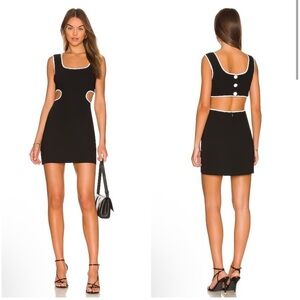 Elegant Black Dress with White Trim